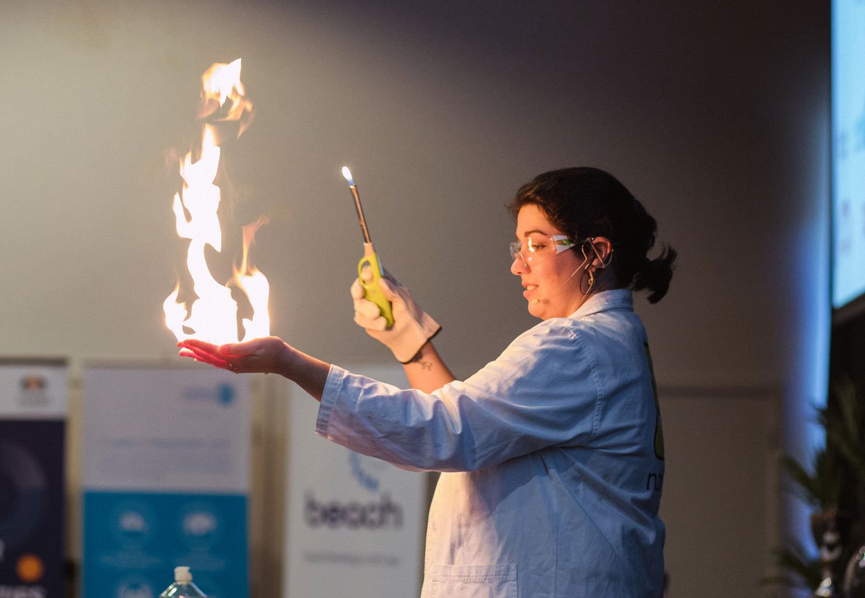 Nanogirl scientist Dr. Kate Sparks performing a live science show